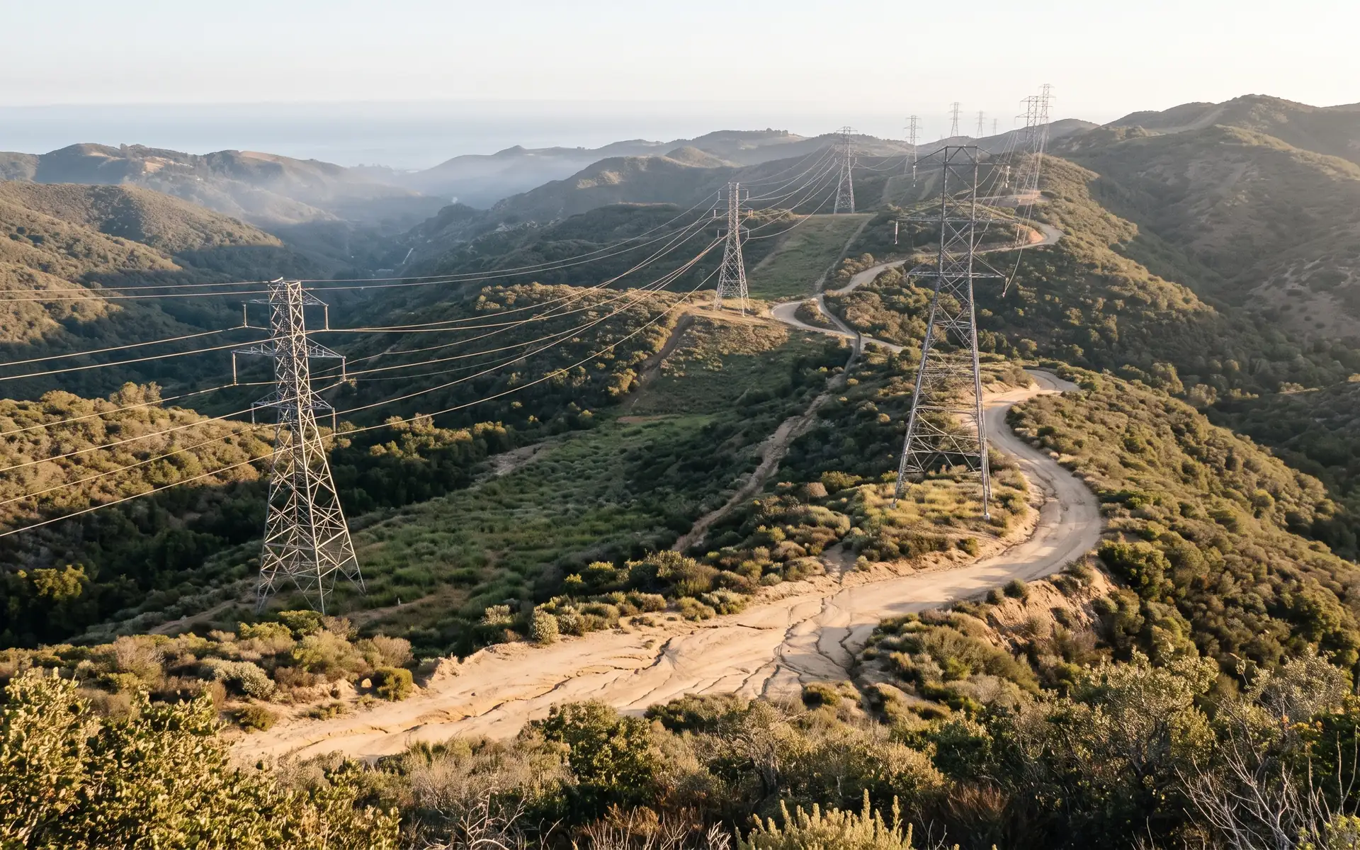 A transmission line right-of-way crossing chaparral hills